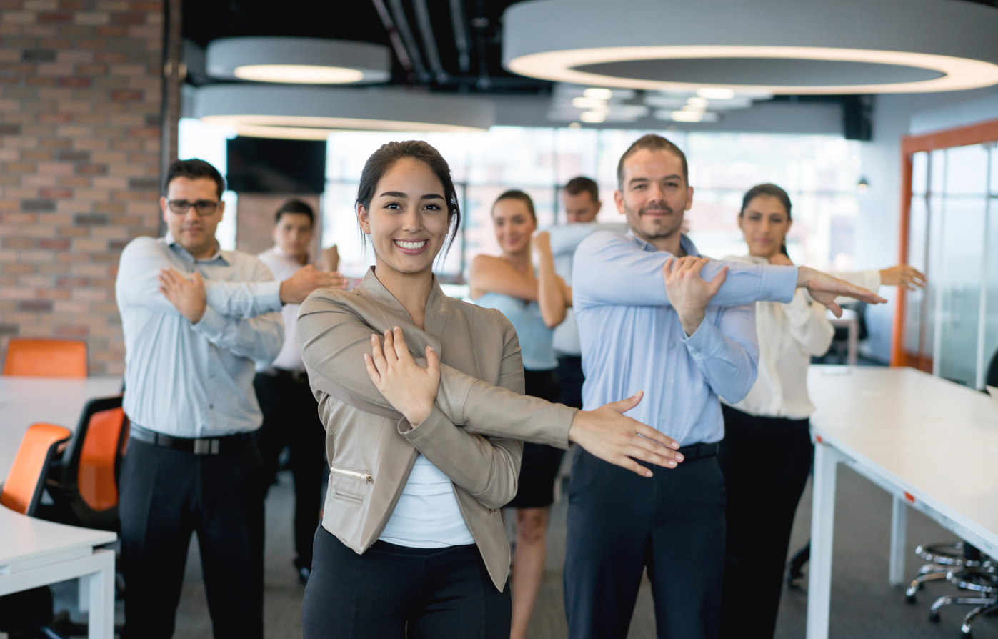 Business people stretching at the office